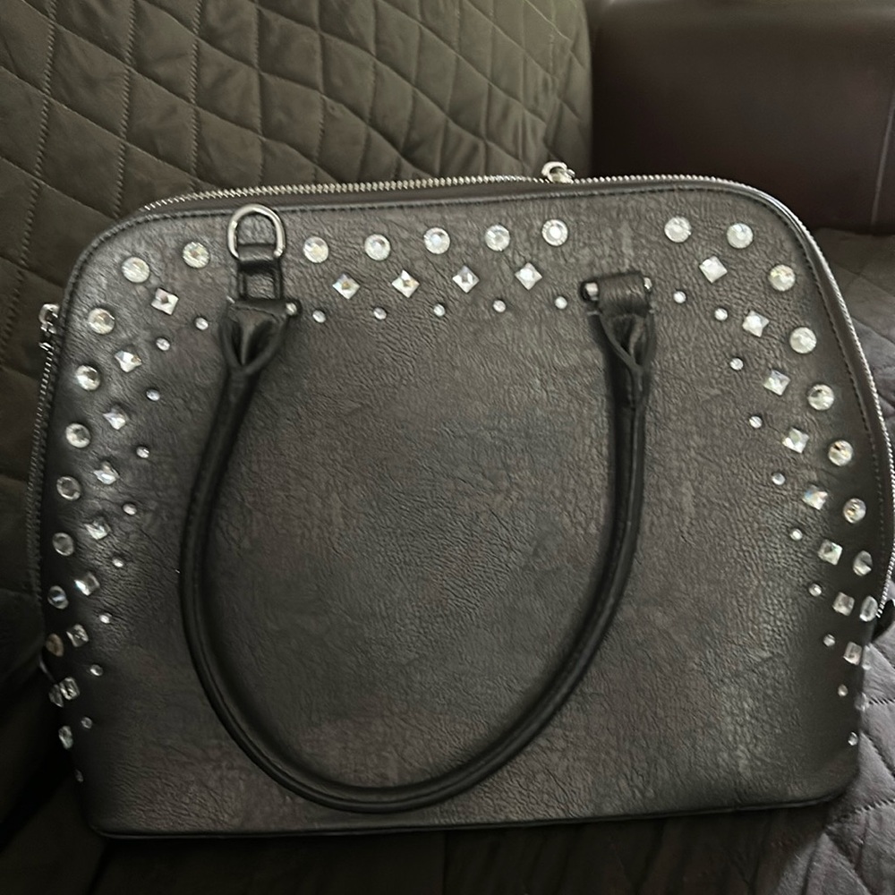 Gray leather, like stone embellished handbag.